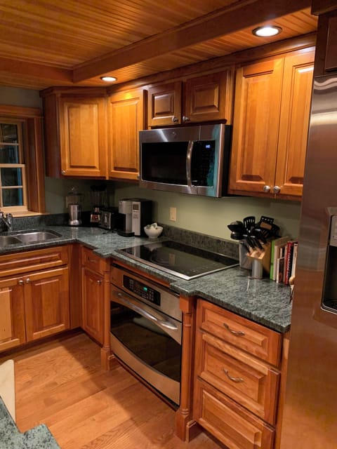 Fully stocked kitchen with granite counters