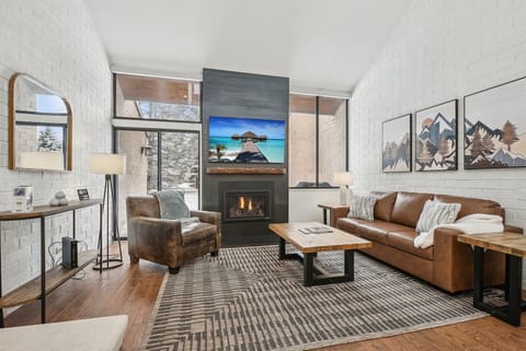 Spacious living area with 24 foot vaulted ceilings