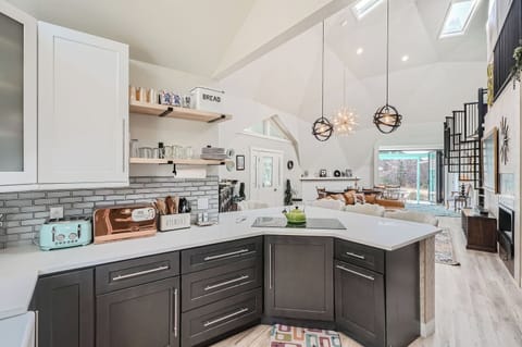 Blends sleek, clean lines, geometry, and functional design of mid-century modern architecture