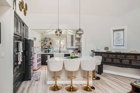 The designer kitchen is connected to the central social hub of the dome