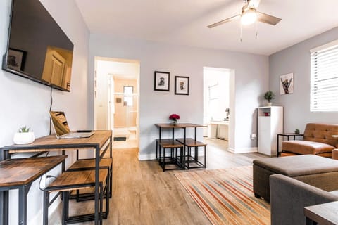 Living room w/dining area and dedicated office desk