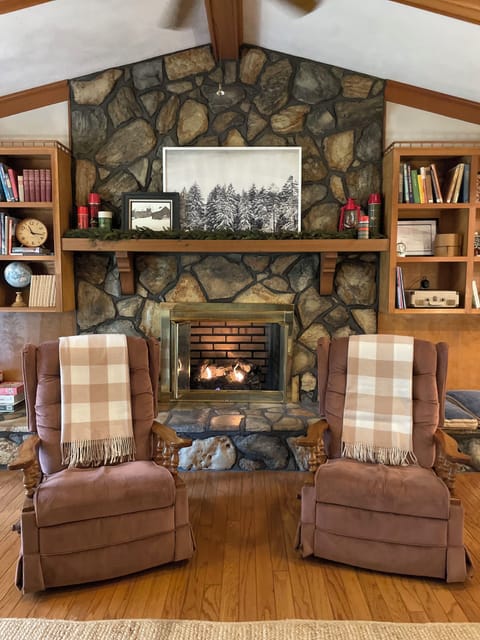 Floor to ceiling stone fireplace