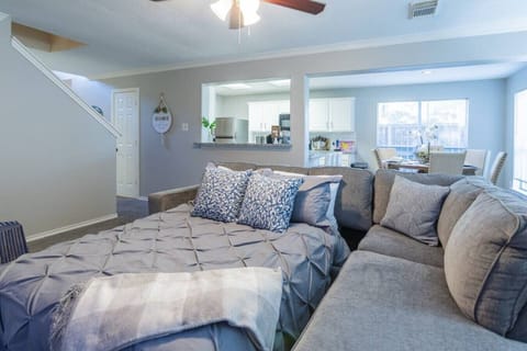 Plush queen sized bed for two adults lies within the super comfortable sleeper sectional!