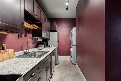 Kitchen with Laundry station including washer & dryer