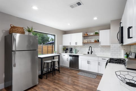 Kitchen with view into back yard