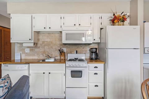 Kitchen is equipped with a coffee pot, toaster and more!