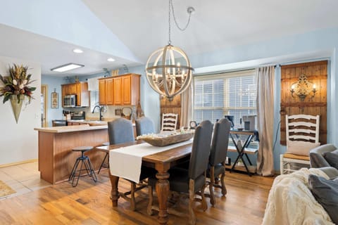 Gather for elegant meals together at the dining table, with seating for 4