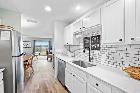 The chic, updated kitchen is spacious & offers all the comforts of home