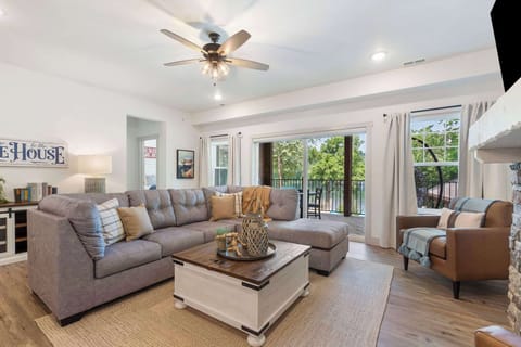 Curl up for a movie or a snooze by the fireplace on the queen sleeper sofa