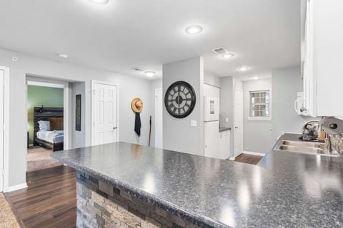 The airy, open kitchen is fully equipped with all the comforts of home