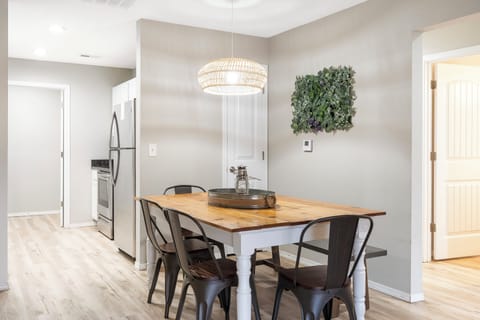 Gather for meals together at the dining table, with seating for 6