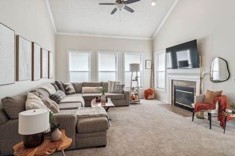 Living Room - Overview - 85 Inch SMART TV - 10 Seater Sectional - 2 Story Lofted