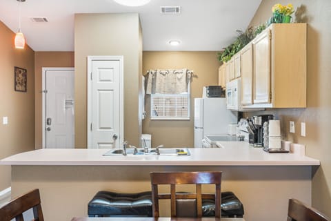 Sip morning coffee or grab a bite at the kitchen counter, with seating for 2