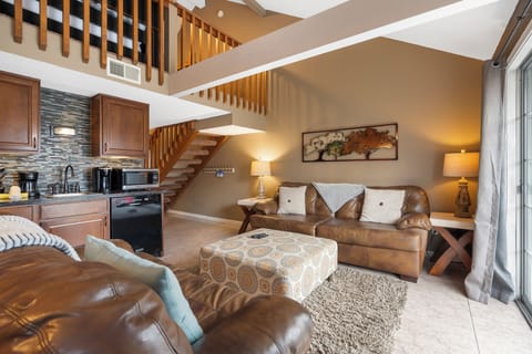 Curl up in the inviting living room & enjoy a movie night at home