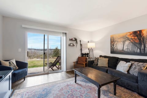 Step into the open living area, welcoming you with epic skyline views