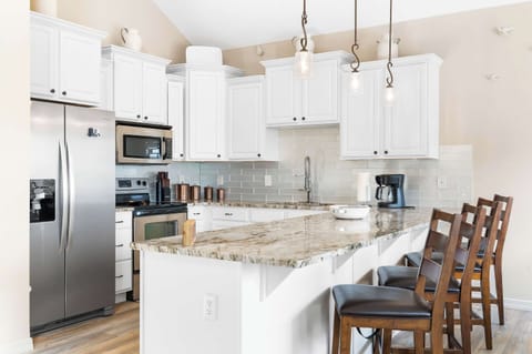 Kitchen bar counter with seating for 3