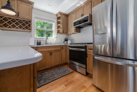 Fully equipped kitchen with full sized appliances and all of the cooking and dining essentials.