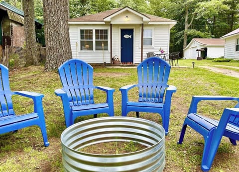 OVERALL:  The front of the cabin and the fun and family-friendly bonfire ring in the front yard.