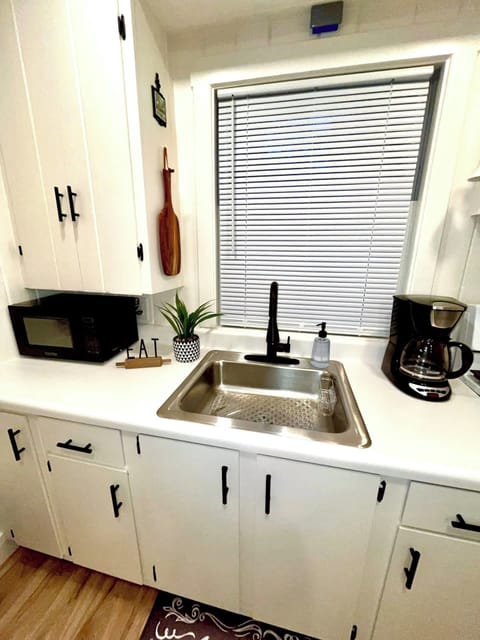 KITCHEN:  Newly-remodeled kitchen with all appliances except for a dishwasher.