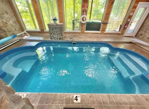 Private indoor pool heat water, great view to the forest.