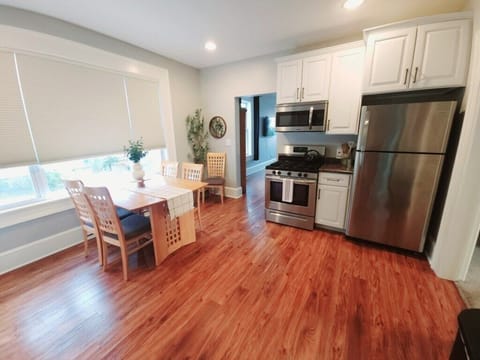 Fully stocked kitchen with gas stove.