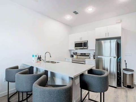 A fully stocked kitchen with all the essentials, ready for you to whip up delicious meals.