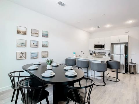 Gather around the spacious dining table for family meals and quality time together.