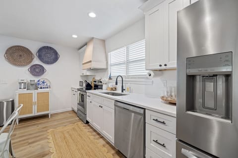 Well stocked kitchen with dishwasher