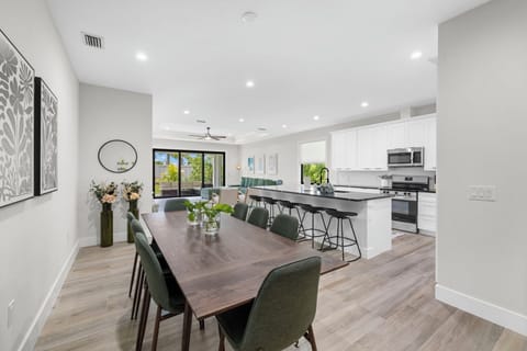 The Dining Room and Kitchen have complimenting designs and plenty of seating.