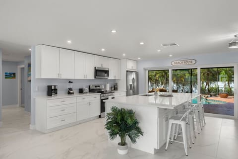 Modern kitchen island offering additional counter seating for casual dining.