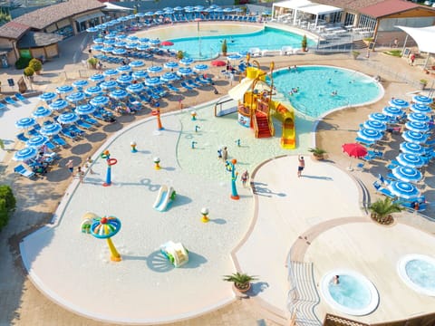 Building, Azure, Swimming Pool, Sky, Shade, Tree, Water, Rectangle, Urban Design, Outdoor Furniture