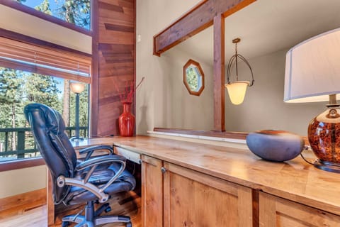 Living Room: Dedicated workspace, office chair and desk