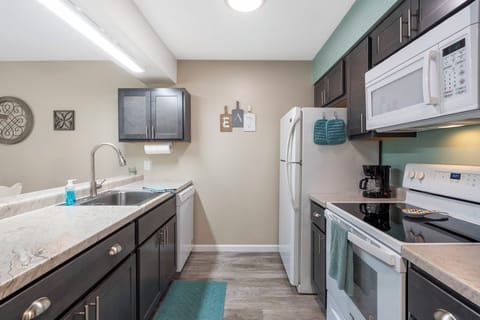 The open, airy kitchen offers ample space & all the comforts of home