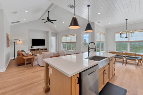 The kitchen overlooks the living room