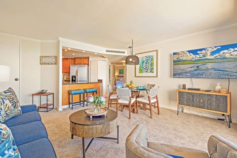 Tropical charm and comfort meet in Kaanapali Shores 903’s dining and living area.