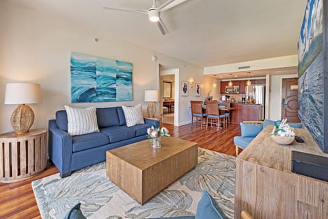 Relax in Honua Kai Konea 206’s open living space with island charm and cozy seating.