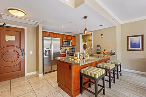 Fully stocked kitchen at Hokulani 214 'Kamalu'—perfect for easy meals and gatherings.