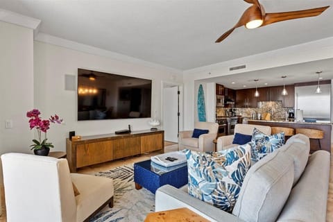 Honua Kai Hokulani 825 boasts a spacious living room with a modern entertainment center.