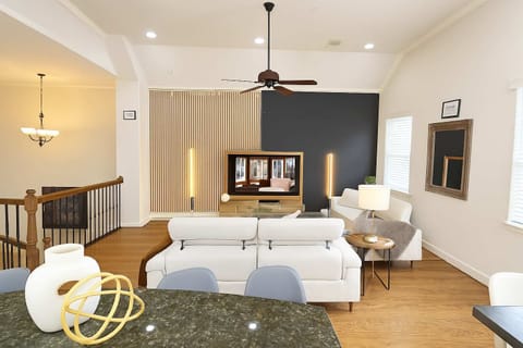 Relaxing living area with smart TV and elegant neutral tones.
