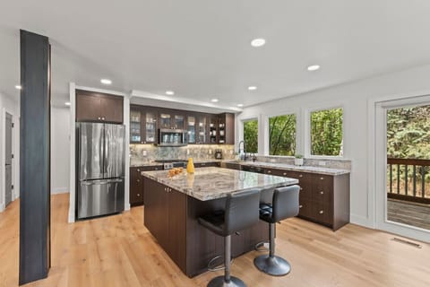 Your front-row seat awaits—watch in style as culinary creations take shape