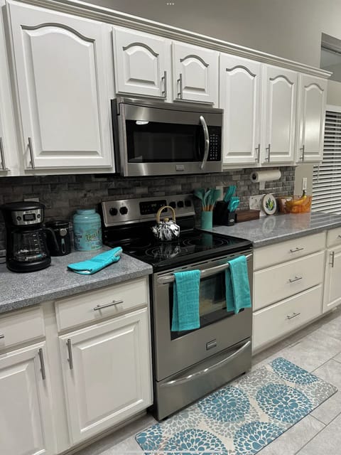 Extra large chef's kitchen with plenty of space for entertaining. 