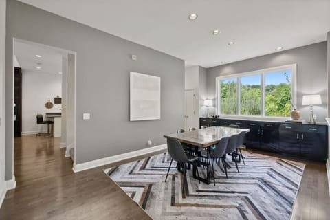 Eight person dining room table with backyard entry