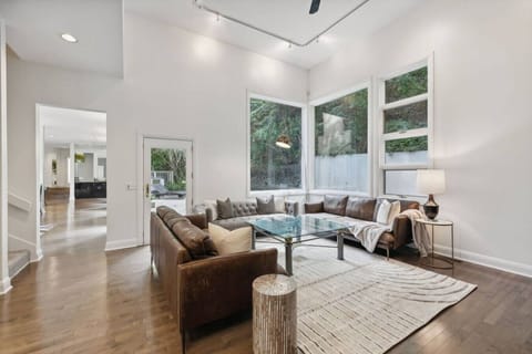 Family Room with ample seating, Smart TV, fireplace and more