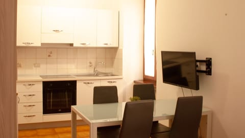 Fridge, microwave, dining tables