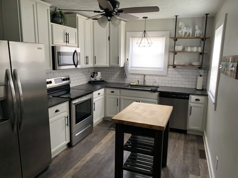 Leather granite countertop with Country sink