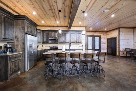 Large kitchen provides plenty of room for family gatherings.