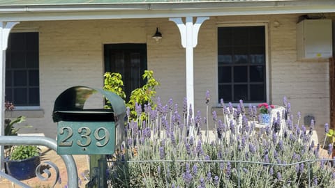 Front of property facing a grass easement on the main street of Yass.