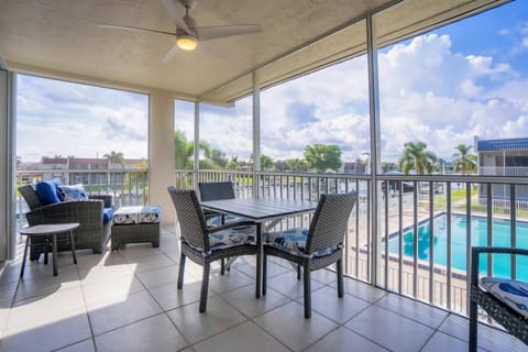 Balcony overlooking pool and canal