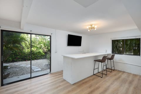 Bonus room with bar and TV located on ground floor off garage. Perfect for entertaining.