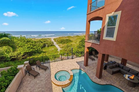 Soak in breathtaking aerial views of the pool and beachfront—where luxury meets the shoreline